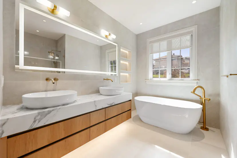Luxury modern bathroom renovation with custom tile, glass shower, and premium fixtures in Vancouver home