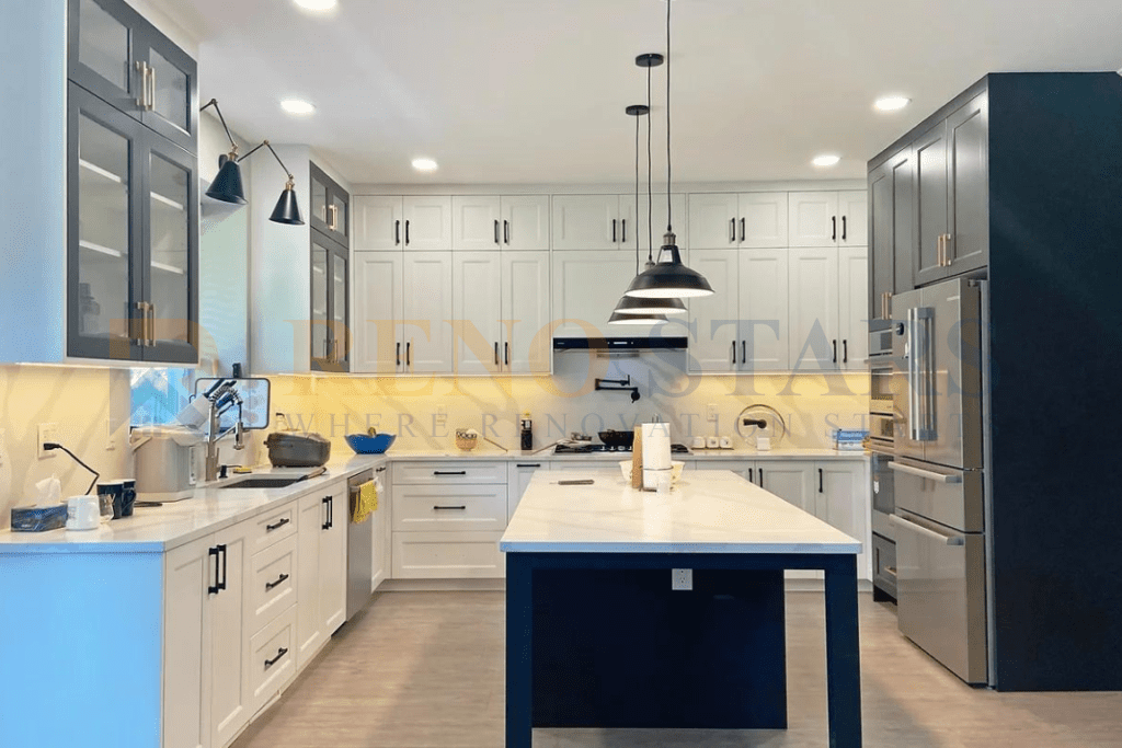 a kitchen with white cabinets and a blue island