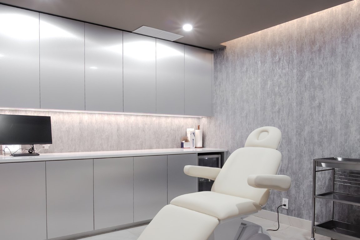 After Renovation; Serene Treatment Room with Custom Cabinets in Medical Spa Remodel in Vancouver​